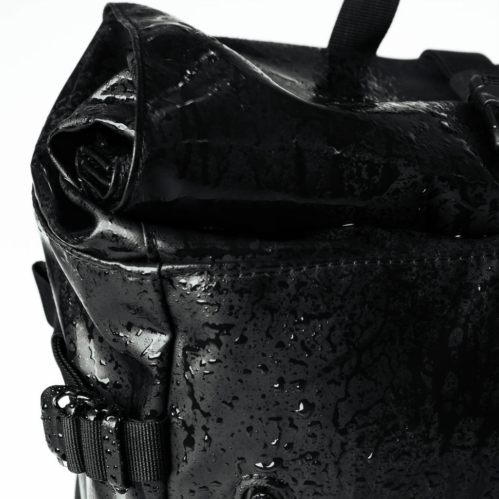 STREAM SLIM ROLLTOP BACK PACK 14”