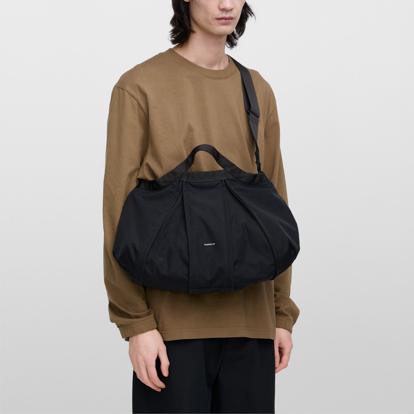 GRID EXPANDABLE CROSSBODY BAG