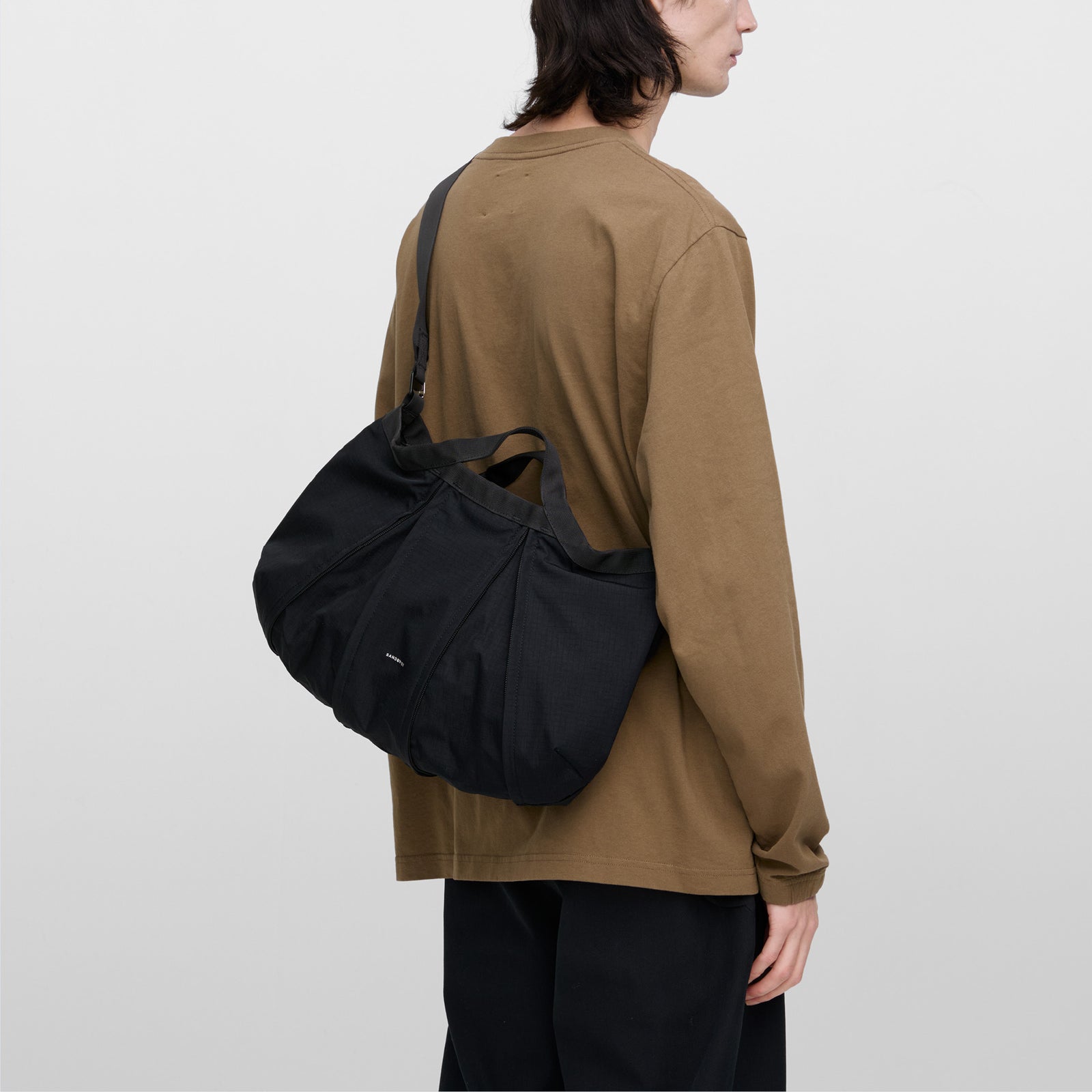 GRID EXPANDABLE CROSSBODY BAG
