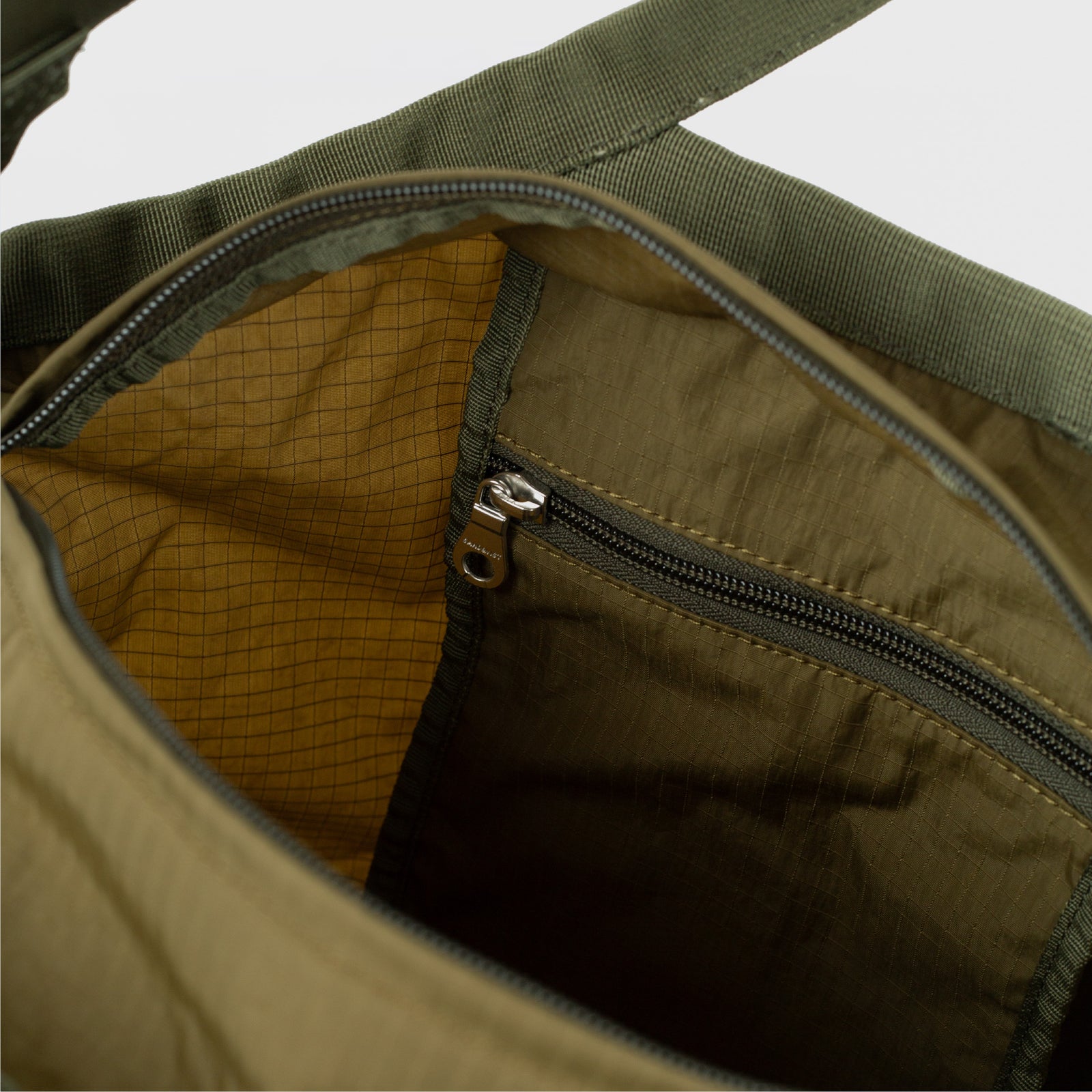 GRID EXPANDABLE CROSSBODY BAG