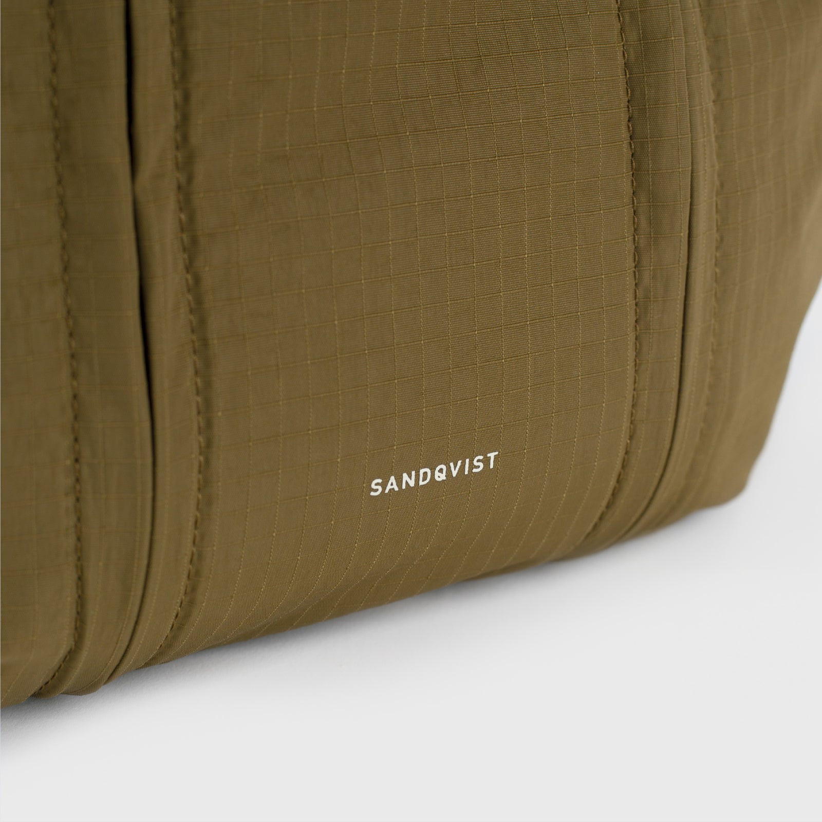 GRID EXPANDABLE CROSSBODY BAG